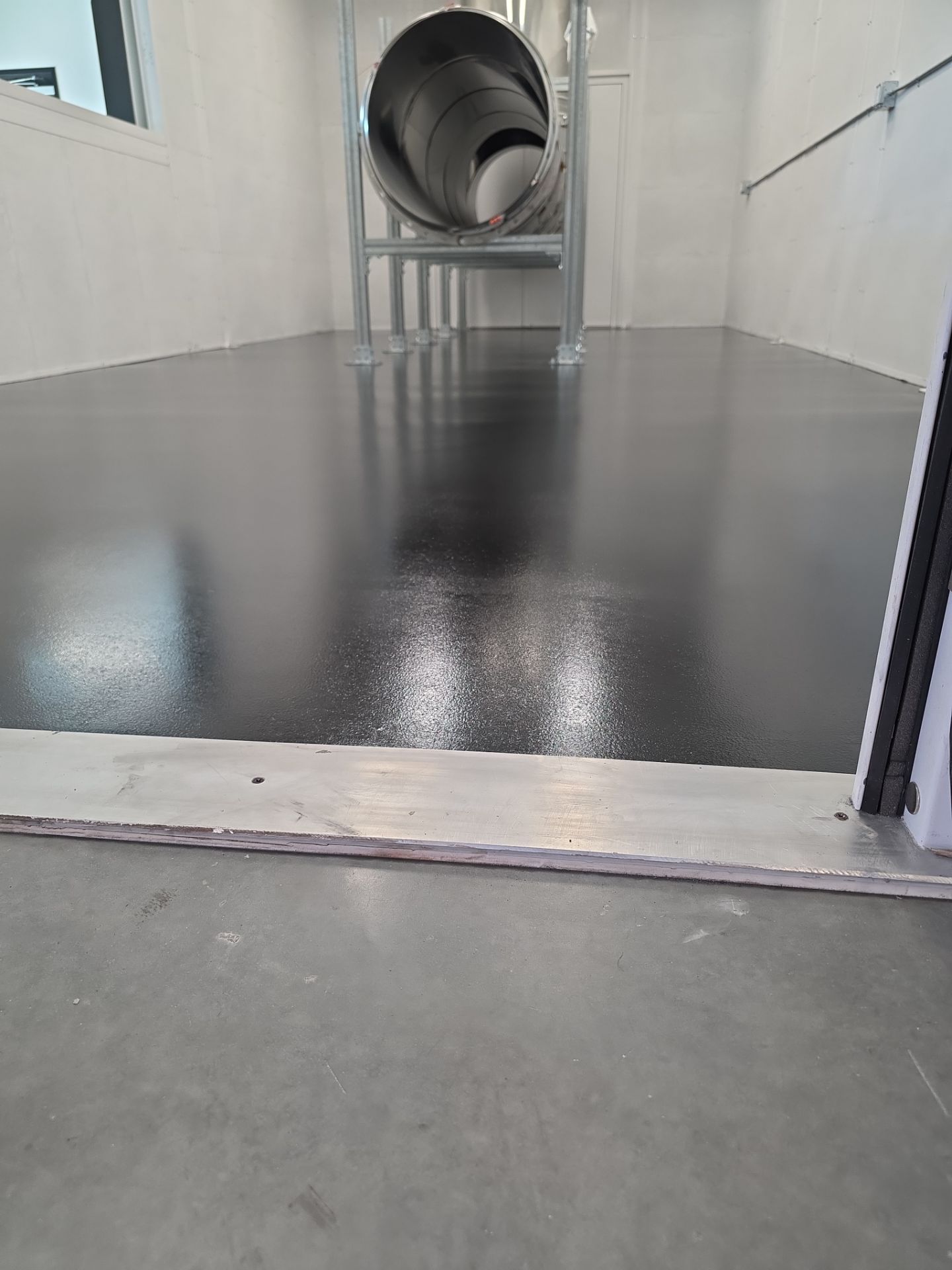 Sleek solid-color epoxy industrial floor
