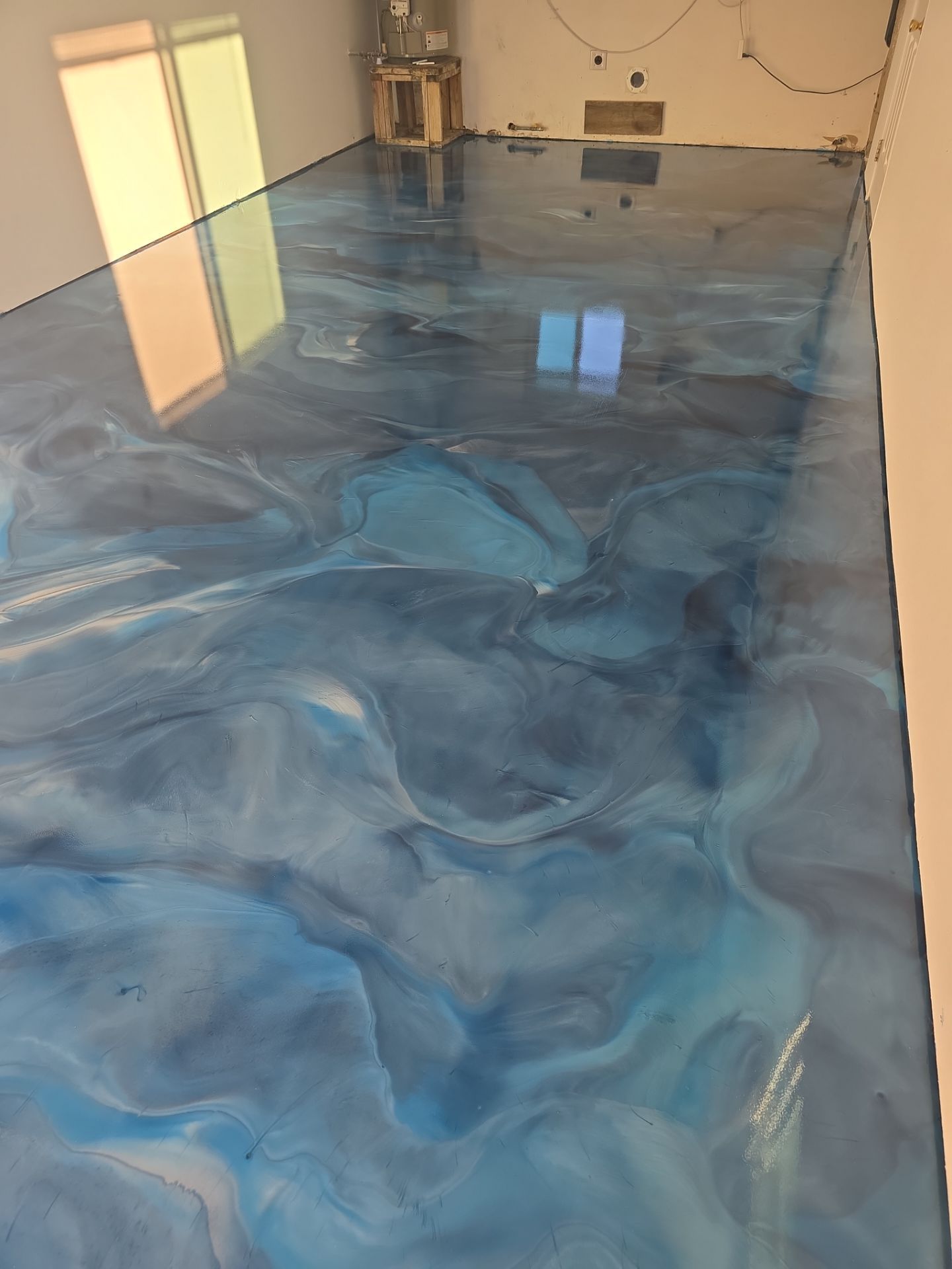 Completed ocean metallic garage floor
