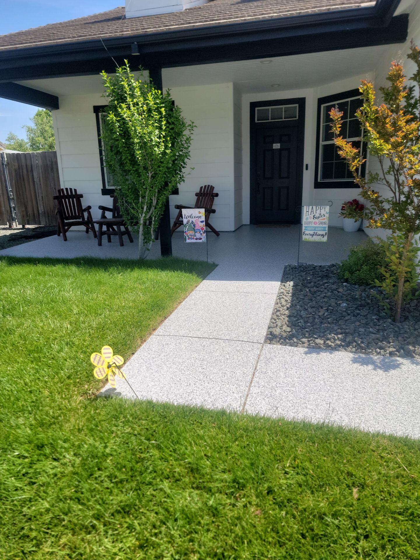 Coated front porch with Adirondack chairs